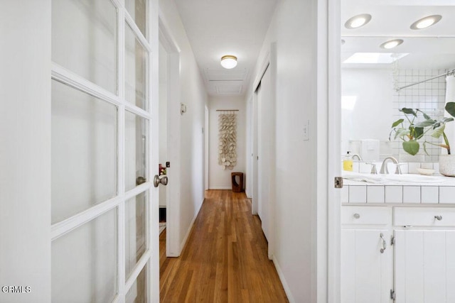 921 Topaz Ct, Ojai, CA 93023 - hall with baseboards, french doors, a sink, and wood finished floors