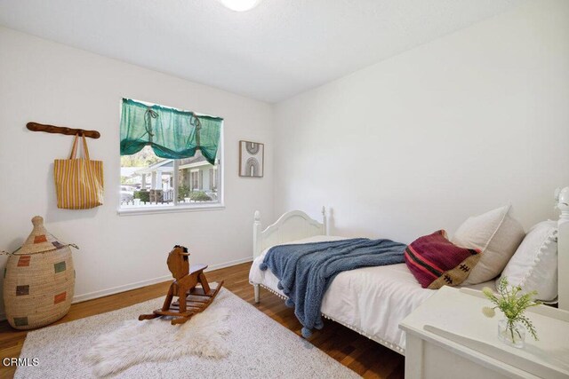 921 Topaz Ct, Ojai, CA 93023 - bedroom with baseboards and wood finished floors