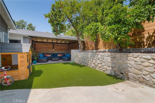 view of yard with an outdoor hangout area, fence, and a patio