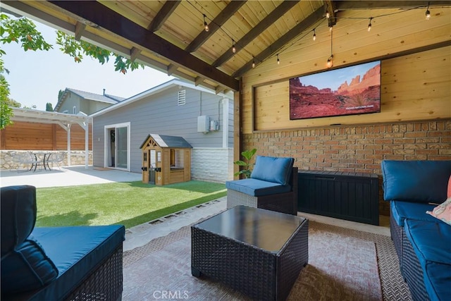 view of patio with outdoor lounge area and a pergola