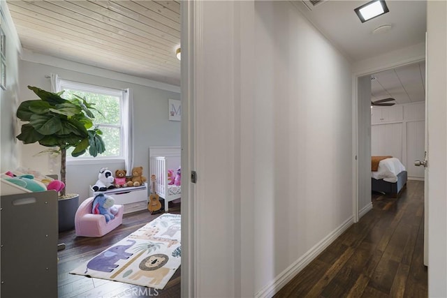 hallway featuring dark wood finished floors