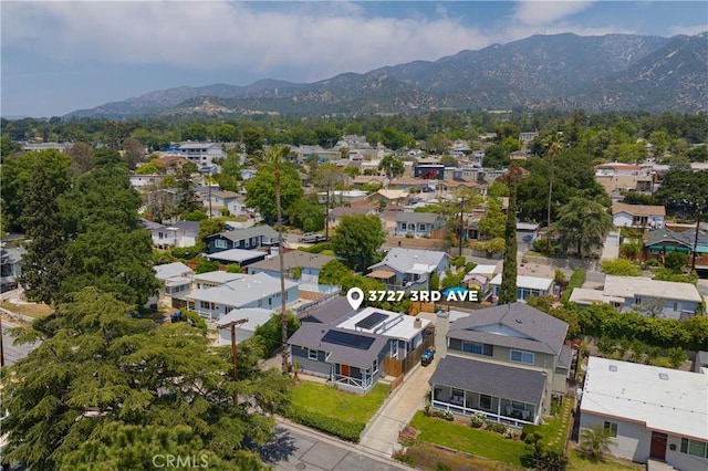 drone / aerial view with a mountain view and a residential view