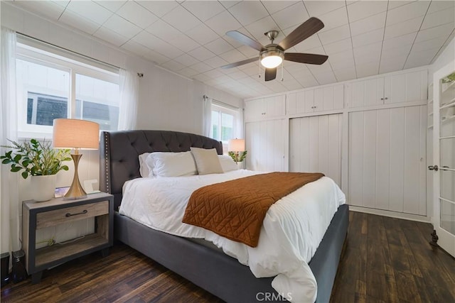 bedroom featuring a ceiling fan and hardwood / wood-style floors