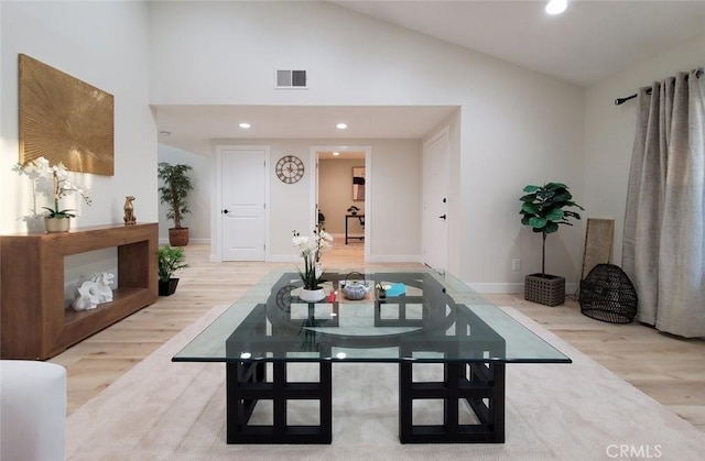1427 N Cannon St, Orange, CA 92869 - dining area featuring baseboards, high vaulted ceiling, visible vents, and wood finished floors