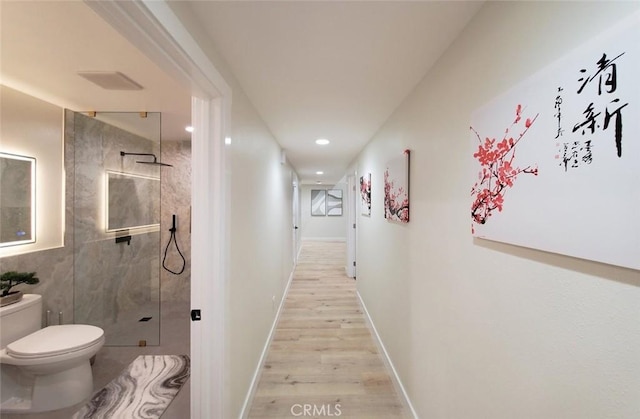 1427 N Cannon St, Orange, CA 92869 - hall with recessed lighting, baseboards, and light wood finished floors