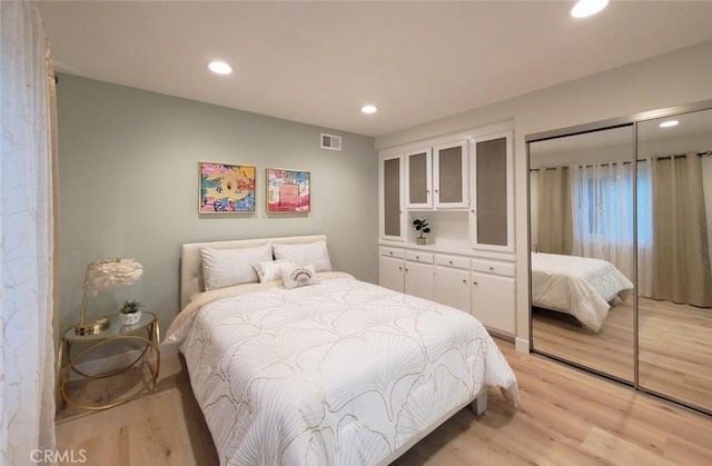 1427 N Cannon St, Orange, CA 92869 - bedroom featuring recessed lighting, visible vents, light wood finished floors, and a closet