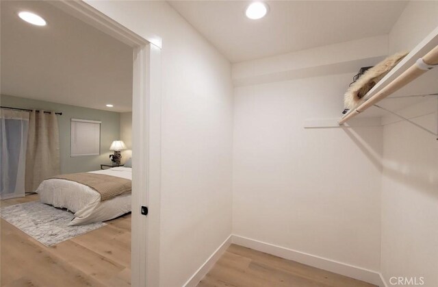 1427 N Cannon St, Orange, CA 92869 - spacious closet featuring light wood-style floors