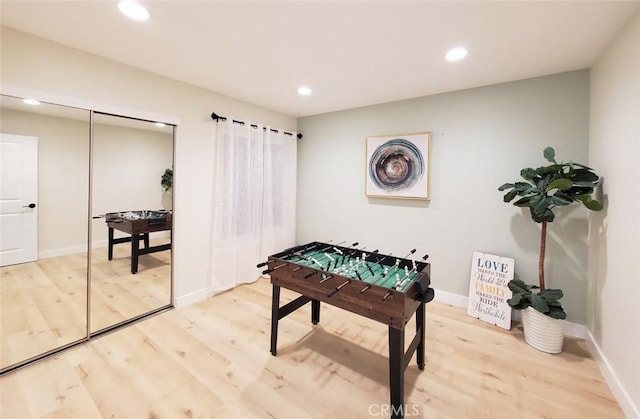 1427 N Cannon St, Orange, CA 92869 - recreation room with recessed lighting, light wood-style flooring, and baseboards