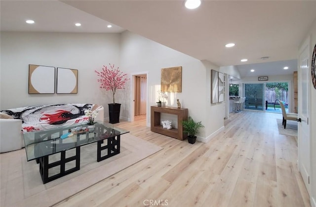 1427 N Cannon St, Orange, CA 92869 - hallway featuring recessed lighting, baseboards, vaulted ceiling, and light wood-type flooring