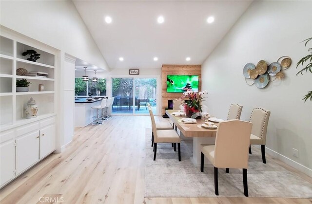 1427 N Cannon St, Orange, CA 92869 - dining area featuring baseboards, vaulted ceiling, recessed lighting, and light wood-style flooring