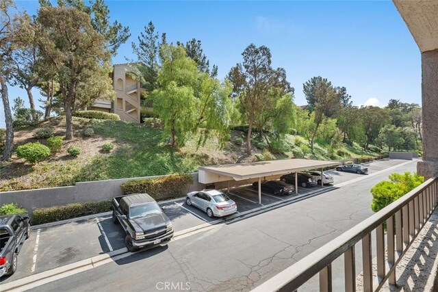 1980 Las Colinas Cir Unit 208, Corona, CA 92879 - view of partially covered parking lot