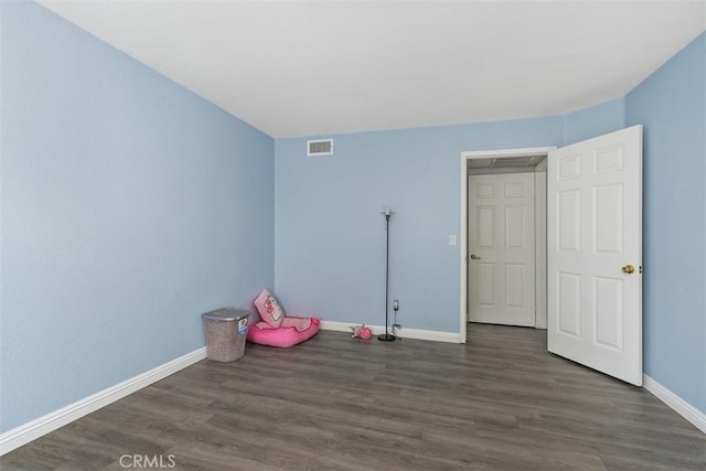 1980 Las Colinas Cir Unit 208, Corona, CA 92879 - unfurnished bedroom featuring baseboards and wood finished floors