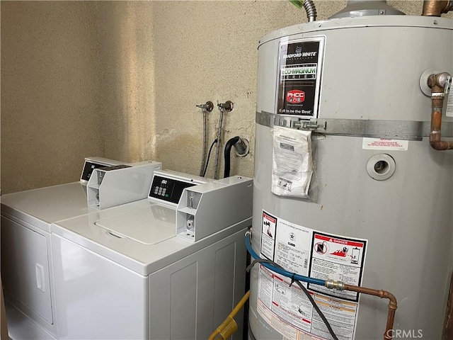 interior space with washer hookup, strapped water heater, and laundry area