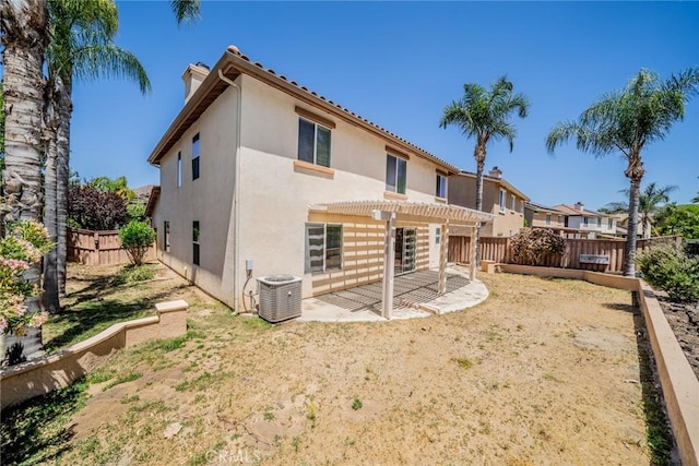 32057 Meadow Wood Ln, Lake Elsinore, CA 92532 - back of property with a pergola, stucco siding, a fenced backyard, and a patio