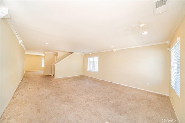 32057 Meadow Wood Ln, Lake Elsinore, CA 92532 - unfurnished living room with crown molding, recessed lighting, light carpet, and baseboards