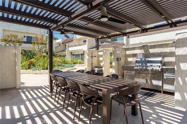 view of patio / terrace featuring grilling area, a ceiling fan, an outdoor kitchen, outdoor dining space, and a pergola