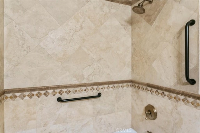 details with a tile shower