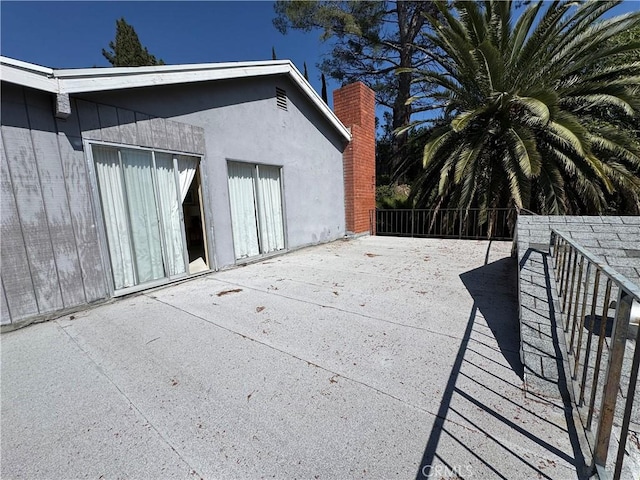 view of patio with fence