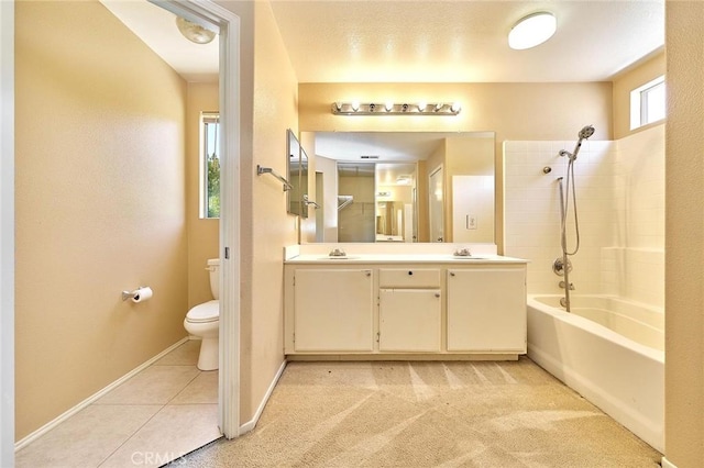 full bath featuring a sink, double vanity, toilet, and  shower combination