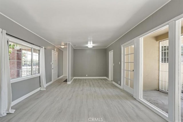 9451 Canterbury Ave, Arleta, CA 91331 - unfurnished room with wood finished floors and baseboards