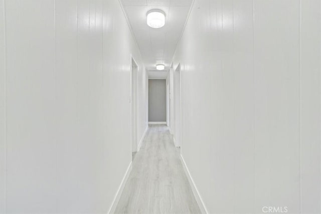 9451 Canterbury Ave, Arleta, CA 91331 - corridor featuring baseboards and light wood-style floors