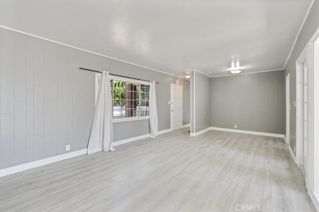 9451 Canterbury Ave, Arleta, CA 91331 - unfurnished room featuring wood finished floors and baseboards