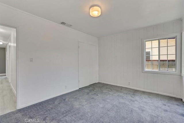 9451 Canterbury Ave, Arleta, CA 91331 - spare room featuring carpet and baseboards