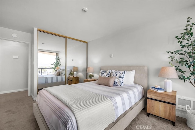 531 Esplanade Unit 714, Redondo Beach, CA 90277 - bedroom with light carpet, baseboards, and a closet