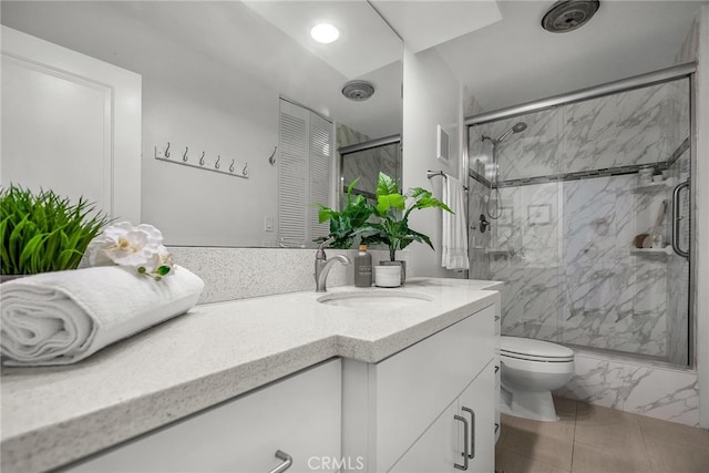 531 Esplanade Unit 714, Redondo Beach, CA 90277 - bathroom with a marble finish shower, vanity, and toilet
