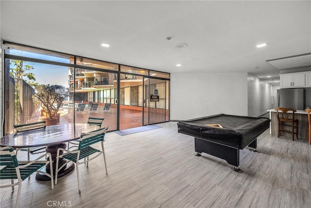 531 Esplanade Unit 714, Redondo Beach, CA 90277 - recreation room featuring expansive windows, billiards table, light wood-style flooring, and recessed lighting