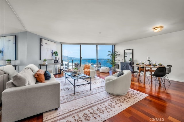 531 Esplanade Unit 714, Redondo Beach, CA 90277 - living area with wood finished floors, expansive windows, baseboards, and a water view