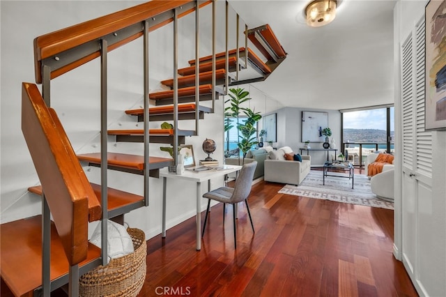 531 Esplanade Unit 714, Redondo Beach, CA 90277 - dining room featuring dark wood finished floors and stairs