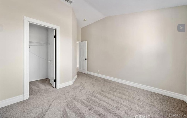 42944 Calle Reva, Temecula, CA 92592 - unfurnished bedroom featuring carpet flooring, vaulted ceiling, baseboards, and a closet