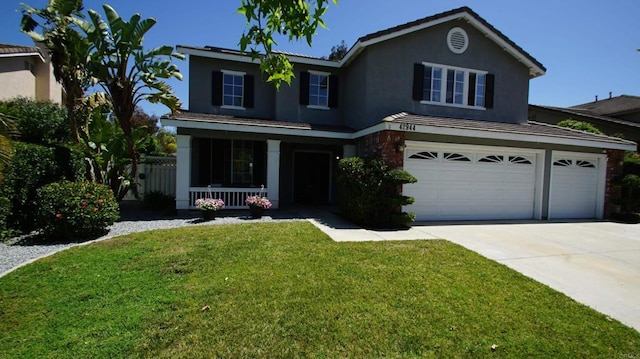 42944 Calle Reva, Temecula, CA 92592 - traditional-style house featuring a porch, stucco siding, concrete driveway, a front yard, and a garage