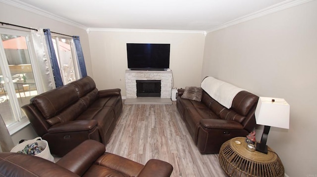 42944 Calle Reva, Temecula, CA 92592 - living room with light wood-type flooring, ornamental molding, and a stone fireplace