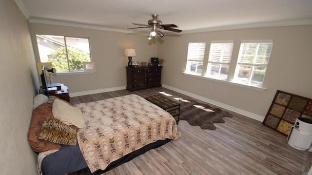 42944 Calle Reva, Temecula, CA 92592 - bedroom featuring wood finished floors, multiple windows, ornamental molding, baseboards, and ceiling fan