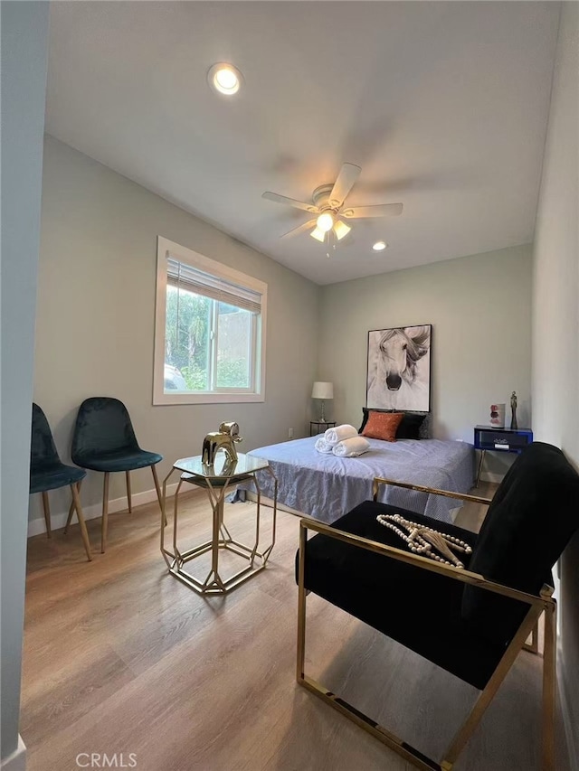 bedroom featuring recessed lighting, baseboards, ceiling fan, and light wood-type flooring