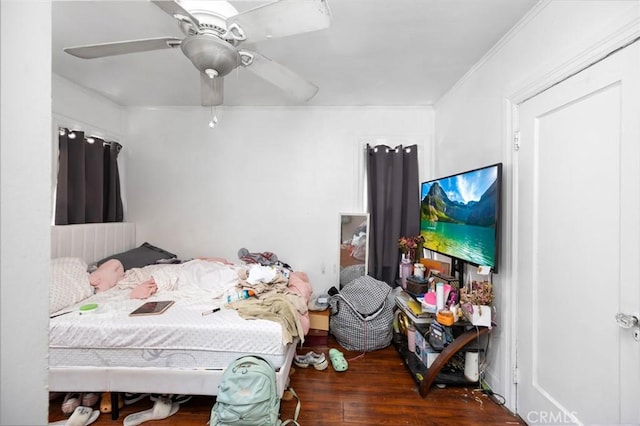 844W 105th St, Los Angeles, CA 90044 - bedroom with crown molding, wood finished floors, and ceiling fan