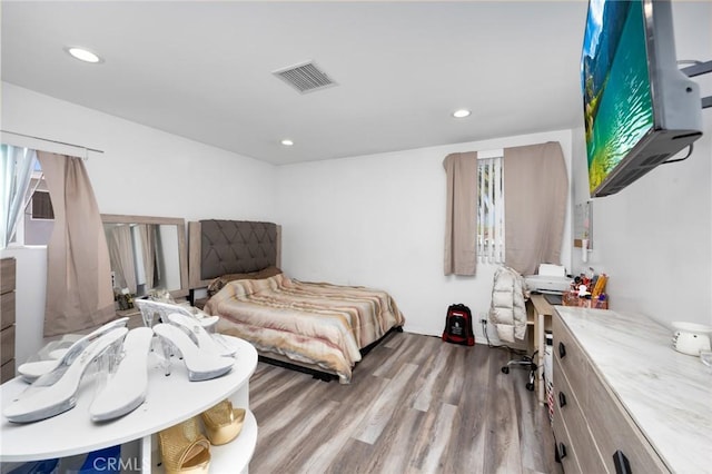 844W 105th St, Los Angeles, CA 90044 - bedroom with wood finished floors and recessed lighting