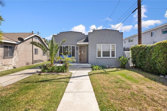 844W 105th St, Los Angeles, CA 90044 - mediterranean / spanish-style home featuring stucco siding