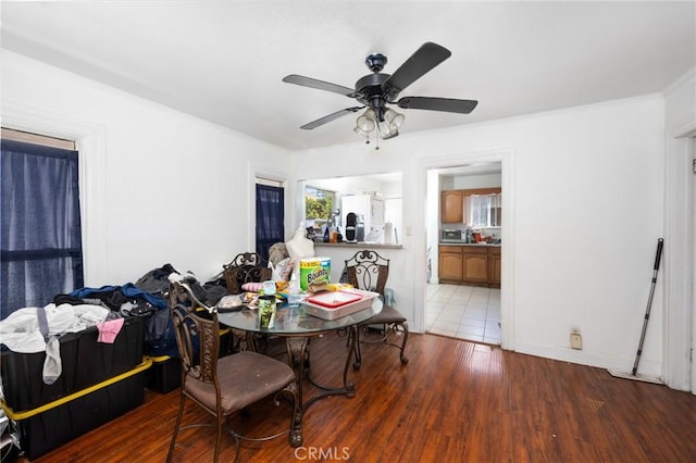 844W 105th St, Los Angeles, CA 90044 - dining area with a ceiling fan and wood finished floors