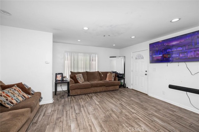 844W 105th St, Los Angeles, CA 90044 - living room with wood finished floors, recessed lighting, and baseboards