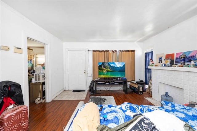844W 105th St, Los Angeles, CA 90044 - living area with wood finished floors and a brick fireplace