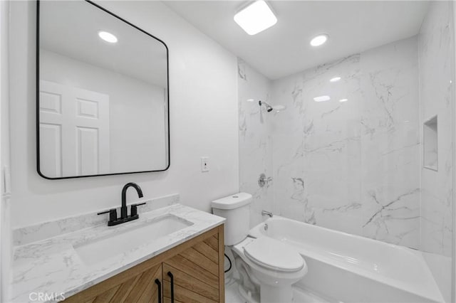 bathroom featuring vanity, recessed lighting, shower / bathtub combination, and toilet