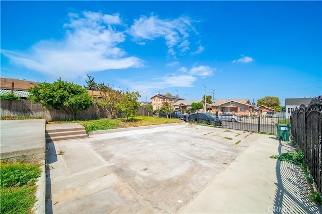 view of patio / terrace with a residential view and fence private yard