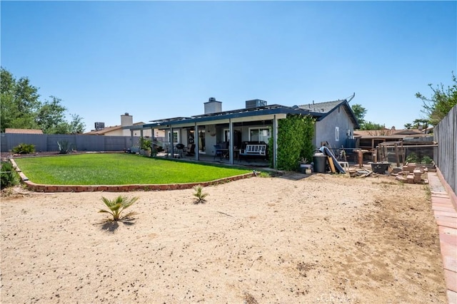 back of house featuring a patio area