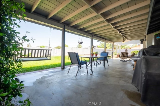 view of patio featuring outdoor dining area and ceiling fan