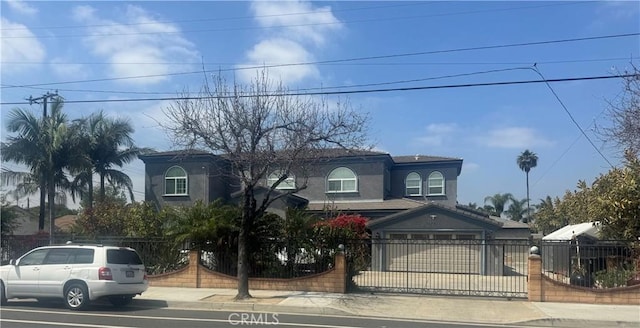 11331 Chapman Ave, Garden Grove, CA 92840 - view of front facade featuring a fenced front yard and stucco siding
