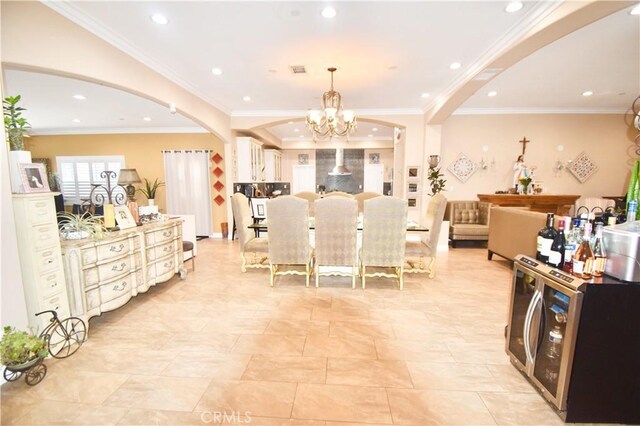 11331 Chapman Ave, Garden Grove, CA 92840 - dining space with arched walkways, a chandelier, recessed lighting, and ornamental molding
