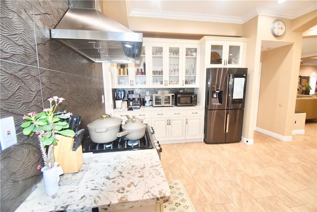 11331 Chapman Ave, Garden Grove, CA 92840 - kitchen with stainless steel fridge, wall chimney exhaust hood, white cabinets, glass insert cabinets, and ornamental molding